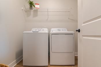A washer and dryer in a laundry room